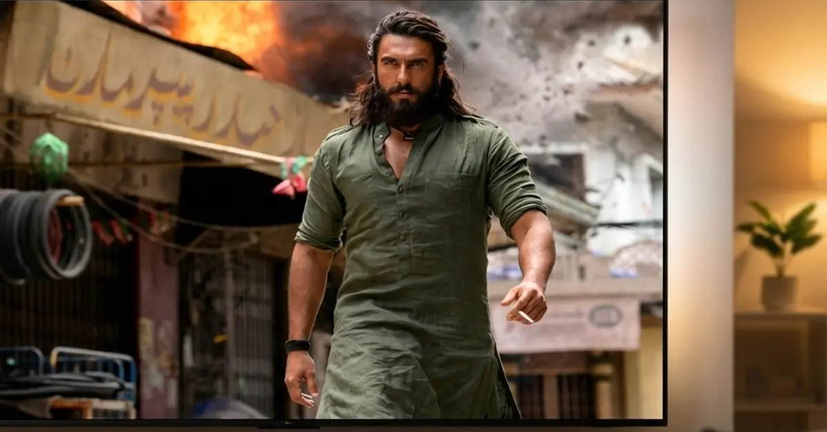 Dhurandhar movie OTT release featured image showing a powerful Bollywood action hero in a dark cinematic setting with streaming platform concept.